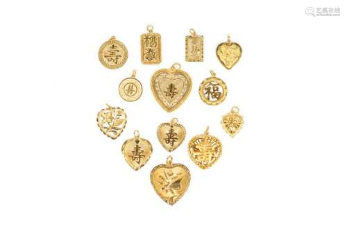 THIRTEEN CHINESE GOLD PENDANTS