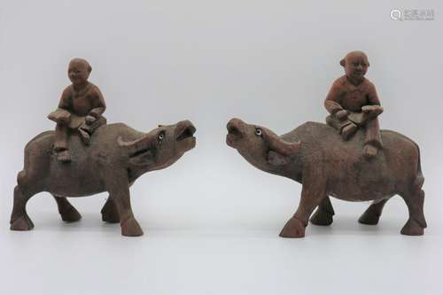 Pair Vintage Asian Carved Bulls with Men