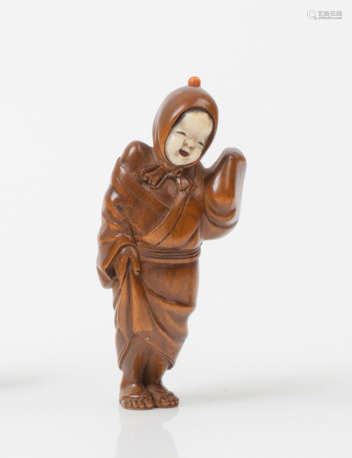 Deux netsuke en buis et ivoire, représentant un da…