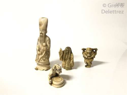 Lot de quatre ivoires, comprenant trois netsuke, r…