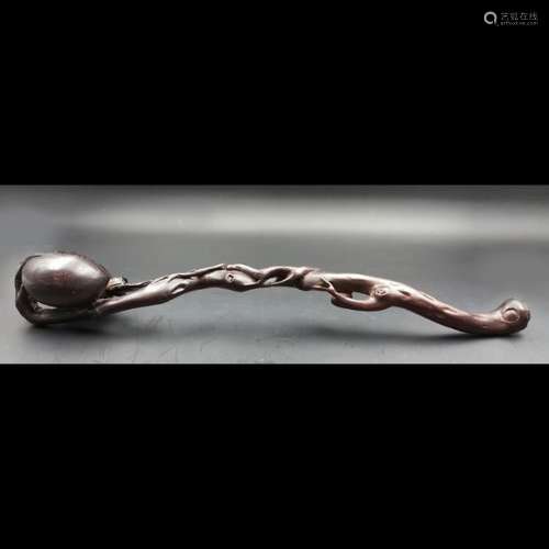 A Chinese Wood Ruyi Scepter Length 32 cm. In good …