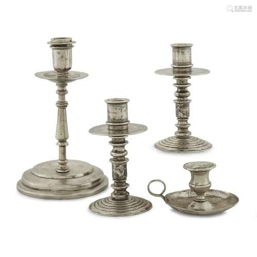 Group of four Spanish Colonial silver candlesticks,