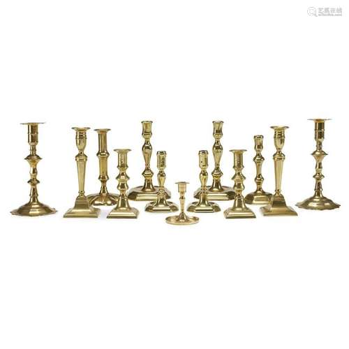 Group of fifteen brass candlesticks, English and Dutch,