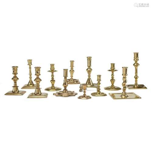 Group of twelve Continental brass candlesticks, Dutch,