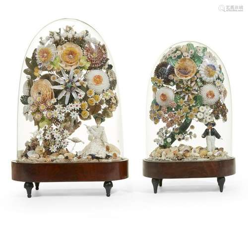 Two Victorian shellwork centerpieces under glass