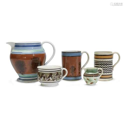 Group of five variously decorated Mochaware items,