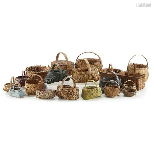 Collection of nineteen miniature woven baskets,