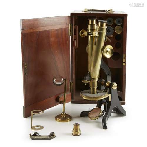 Brass binocular microscope with mahogany traveling