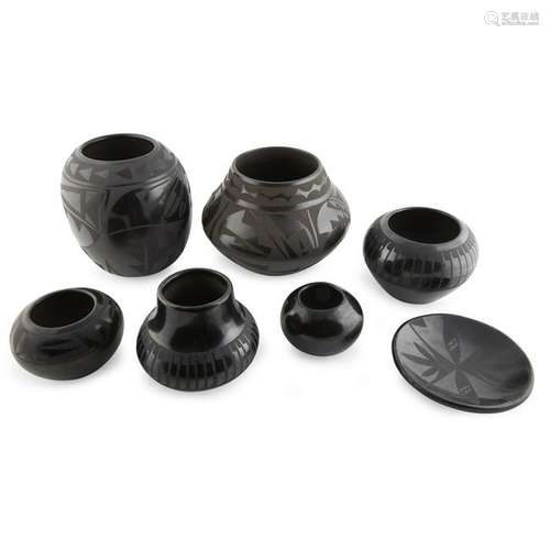 Group of seven Santa Clara and San Ildefonso blackware