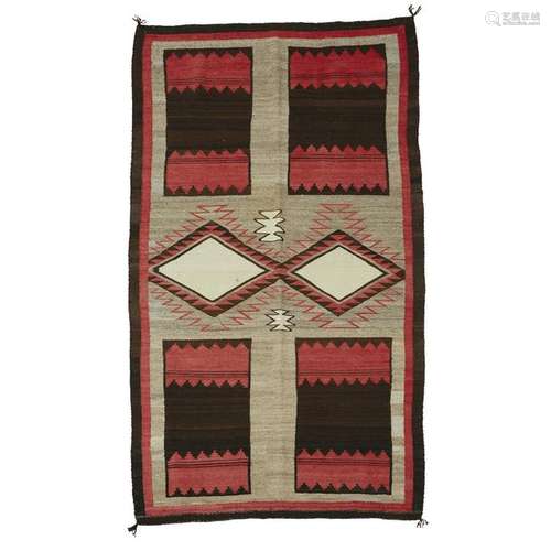 Navajo rug with unusual dress pattern, 20th century