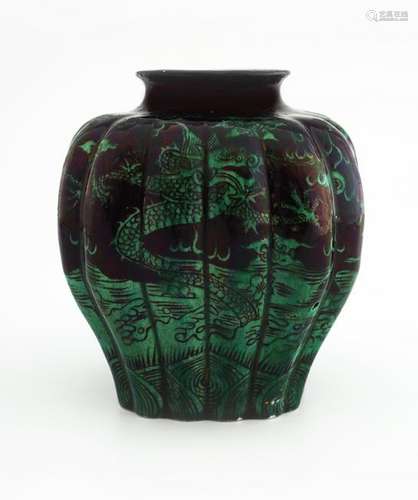 A RARE BLACK-GROUND GREEN-GLAZED STONEWARE VASE