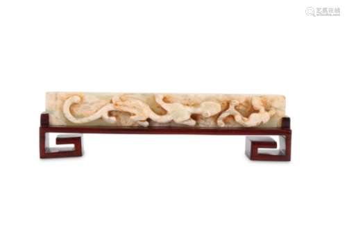 A CHINESE PALE CELADON JADE ‘CHILONG’ SCROLL WEIGHT.