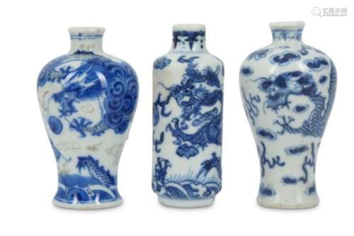 THREE CHINESE BLUE AND WHITE MINIATURE 'DRAGON' VASES.
