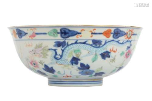 A CHINESE FAMILLE ROSE AND UNDERGLAZE BLUE ‘DRAGON AND PHOENIX’ BOWL.