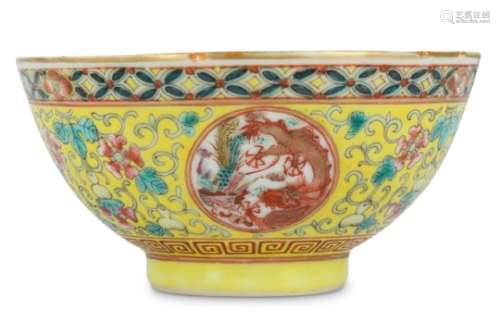 A CHINESE FAMILLE ROSE YELLOW-GROUND 'DRAGON' BOWL.
