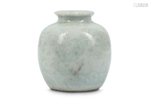 A CHINESE WHITE-GLAZED ‘DRAGON’ JAR.