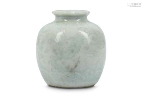 A CHINESE WHITE-GLAZED ‘DRAGON’ JAR.