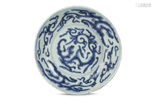 A CHINESE BLUE AND WHITE ‘DRAGON’ DISH.