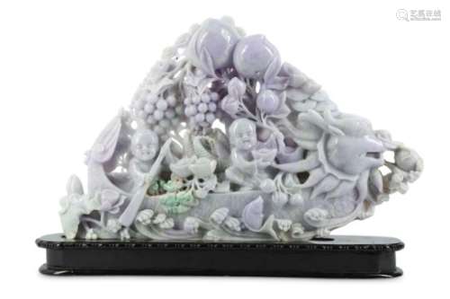 A CHINESE LAVENDER JADEITE ‘DRAGON BOAT’ CARVING.