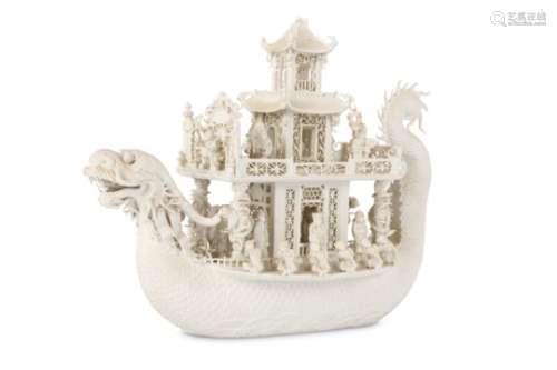 A CHINESE WHITE BISCUIT MODEL OF A DRAGON BOAT.