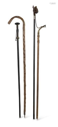 FOUR WALKING STICKS LATE 19TH CENTURY