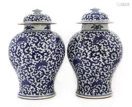 A pair of Chinese blue and white vases and covers,