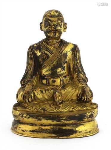 A Tibetan bronze figure,