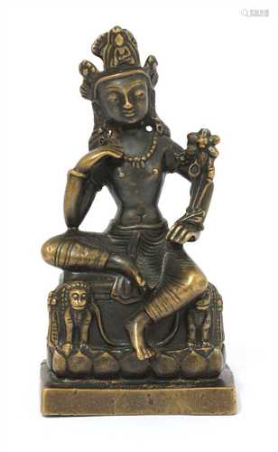 A bronze bodhisattva,