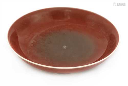 A Chinese red glazed plate,