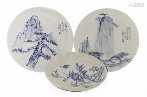 A collection of three Chinese blue and white plates,