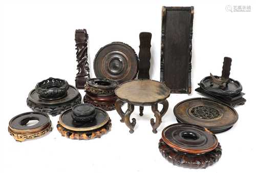 A collection of Chinese wood stands,