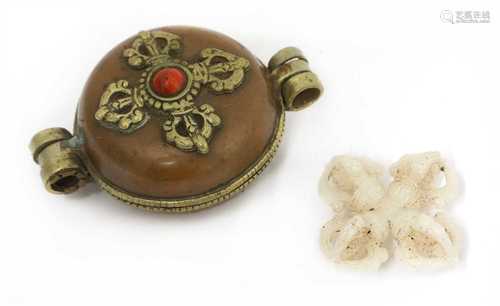 A Chinese jade double vajra,