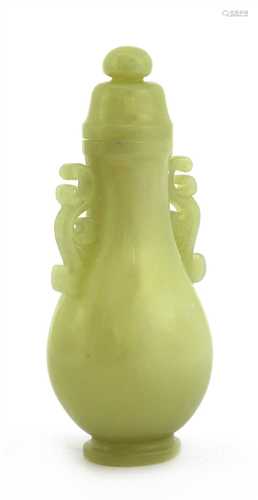 A Chinese jade vase and cover,