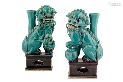 PAIR OF TURQUOISE-GLAZED BUDDHISTIC LION JOSS STICK HOLDERS, QING DYNASTY