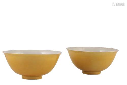 TWO SIMILAR YELLOW-GLAZED BOWLS, XUANTONG SIX CHARACTER MARKS AND OF THE PERIOD