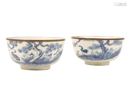 PAIR OF BLUE AND WHITE 'CRANE AND PINE TREES' BOWLS, KANGXI PERIOD