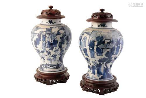 LARGE PAIR OF BLUE AND WHITE '100 BOYS' JARS, KANGXI PERIOD