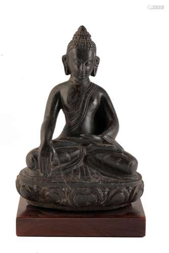 CARVED BLACK STONE BUDDHA, TIBET, 16TH - 18TH CENTURY