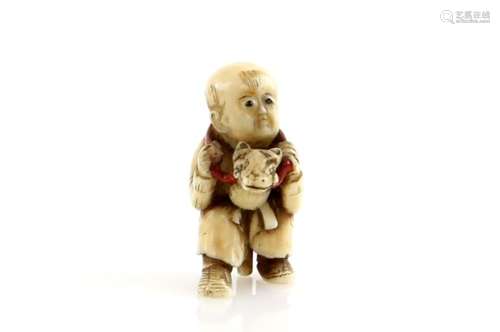 An ivory netsuke of a boy on a hobby horse, unsigned, Meiji PeriodProvenance: The Property of a