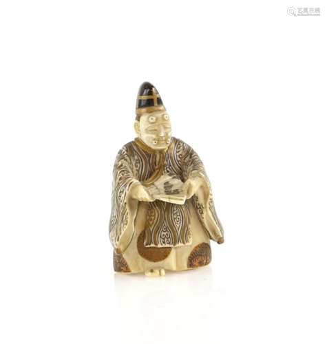 A lacquered ivory netsuke of a Sambaso Dancer or Noh Theatre Actor, wearing a mask and holding a