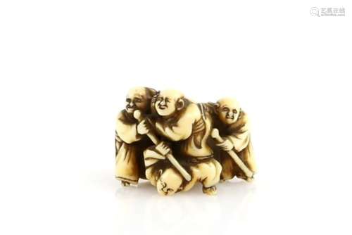 An ivory netsuke of five blind masseurs fighting together, 19th CenturyProvenance: The Property of a