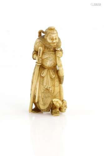 A stained ivory okimono of Shoki, The Demon Queller, holding his sword and keeping an Oni underfoot,