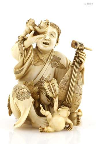 A stained ivory okimono carved as a seated musician, holding a biwa with his left hand and a pair of