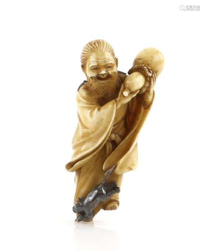 A stained ivory netsuke carved as Chokwaro Sennin holding his gourd with both hands whilst the Magic