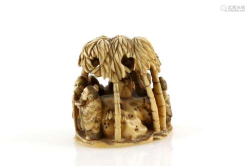 A stained ivory netsuke carved as The Seven Sages in The Bamboo Grove Story; the himotoshi on the