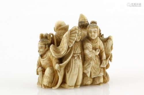 An okimono style netsuke carved as a number of standing scholars, courtiers or other figures, 19th