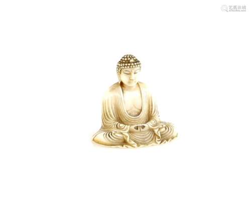 A small ivory okimono, for personal devotion, of a Buddhist Deity, seated in dhyanasana, with both