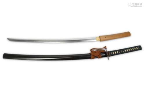 A KATANA. Muromachi period. The blade: shinogizukuri with itamehada, gunome choji midare hamon,