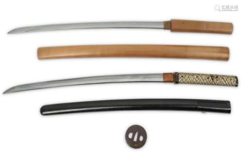 TWO WAKIZASHI AND A TSUBA. The blade of shinogi zukuri with kissaki, nagasa 51cm, and 48cm, together