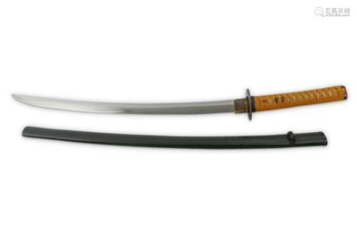 A LARGE WAKIZASHI. Early Edo period. The blade of shinogi zukuri with suguha, bearing a signature
